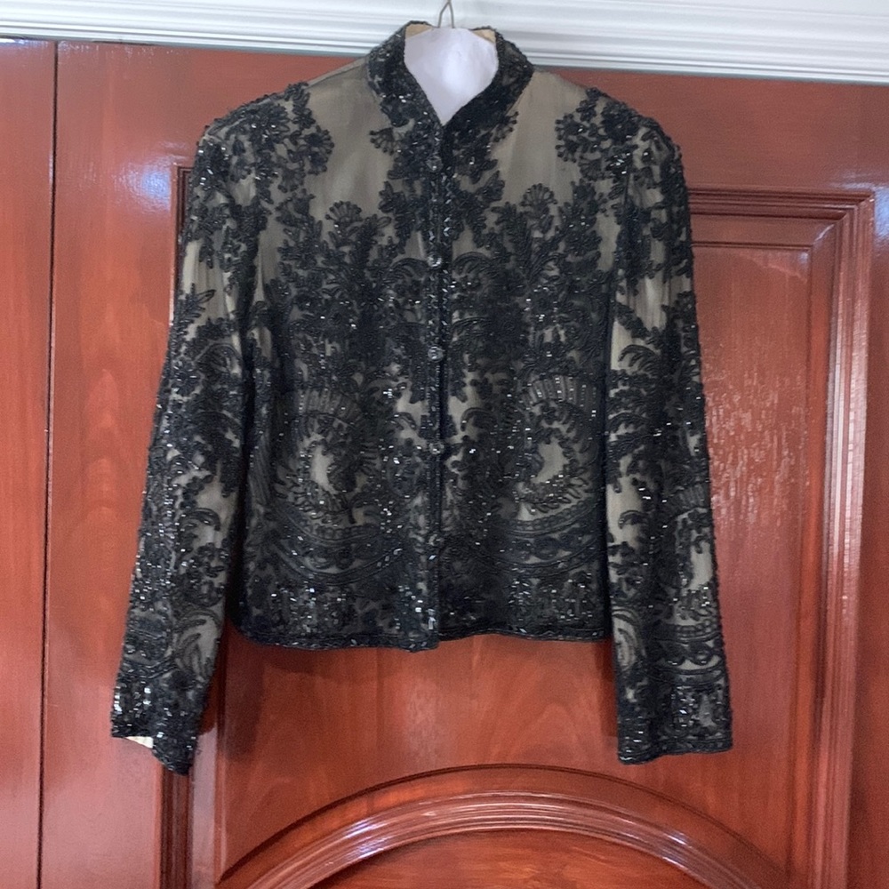 Beaded lined evening jacket.